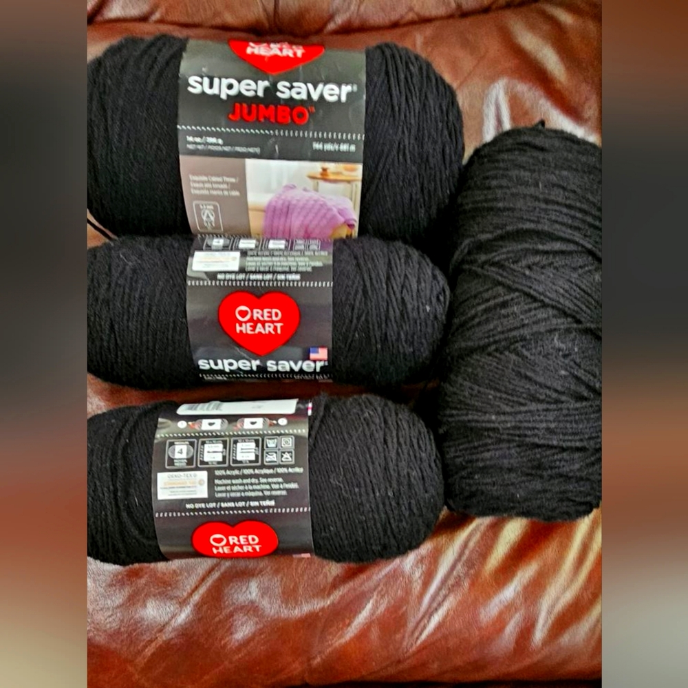 Two Red Heart Jumbo Size Yarn and Two Super Saver Red Heart in Black.